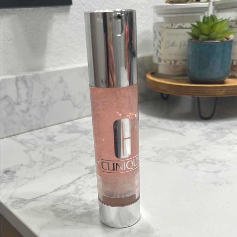 Clinique Moisture Surge in Pink with Silver Cap